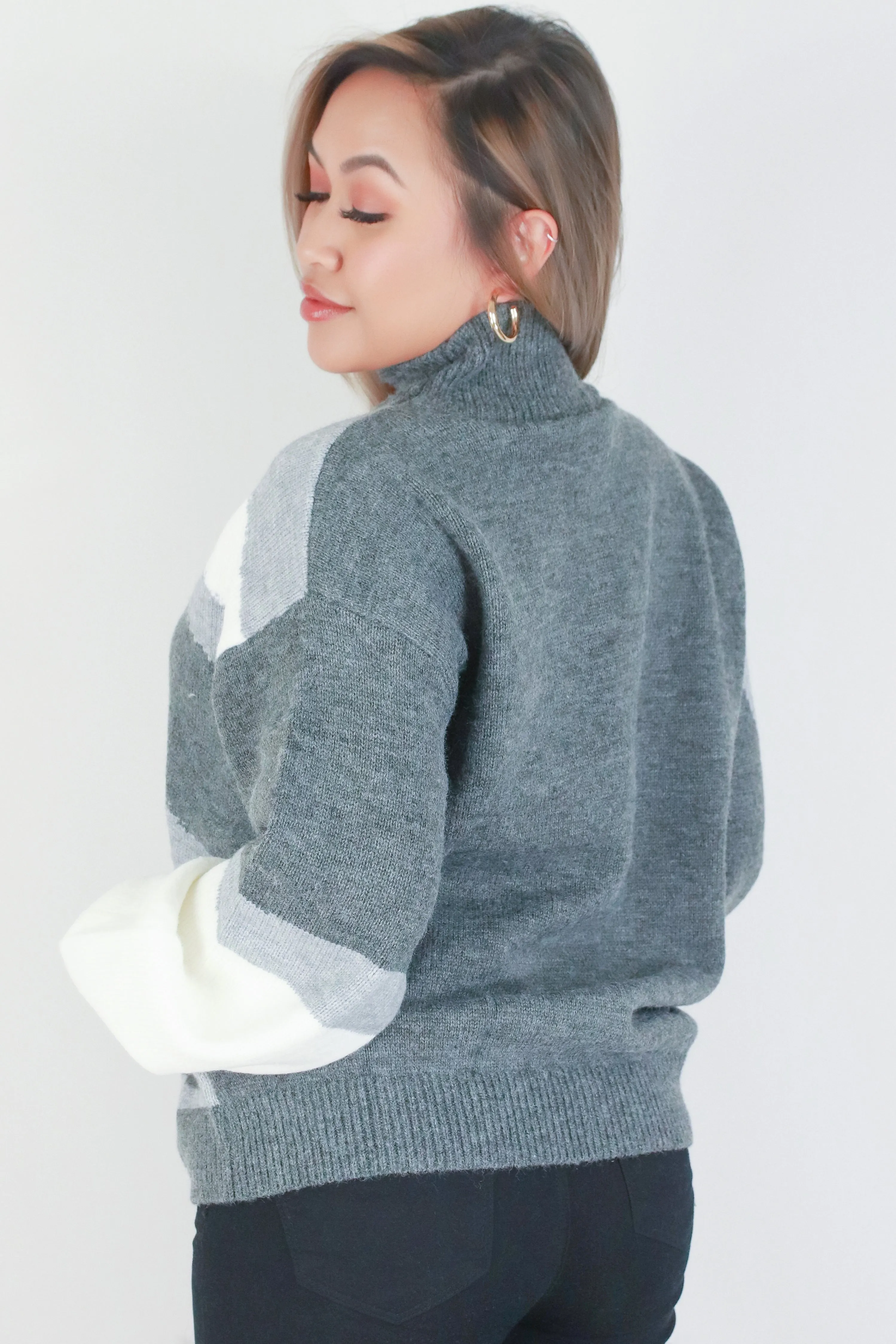 MOCK NECK ABSTRACT SWEATER