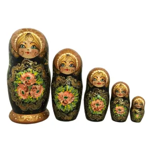 Traditional nesting dolls pink flowers